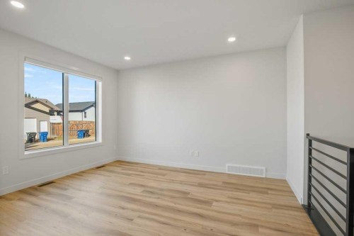 151 Cedar Square, Blackfalds, AB - Indoor Photo Showing Other Room