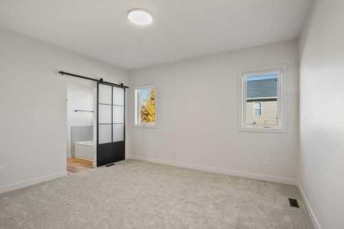 151 Cedar Square, Blackfalds, AB - Indoor Photo Showing Other Room