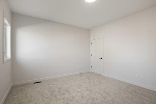 151 Cedar Square, Blackfalds, AB - Indoor Photo Showing Other Room