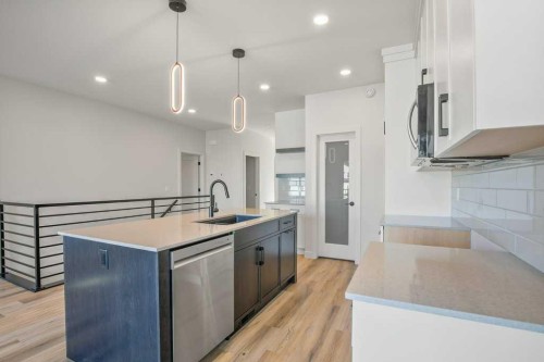 151 Cedar Square, Blackfalds, AB - Indoor Photo Showing Kitchen With Upgraded Kitchen