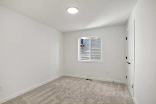 5 Songbird Green, Sylvan Lake, AB - Indoor Photo Showing Other Room