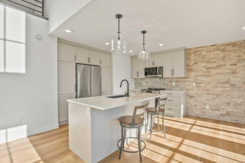 5 Songbird Green, Sylvan Lake, AB - Indoor Photo Showing Kitchen With Upgraded Kitchen