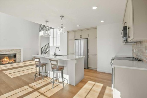 5 Songbird Green, Sylvan Lake, AB - Indoor With Fireplace