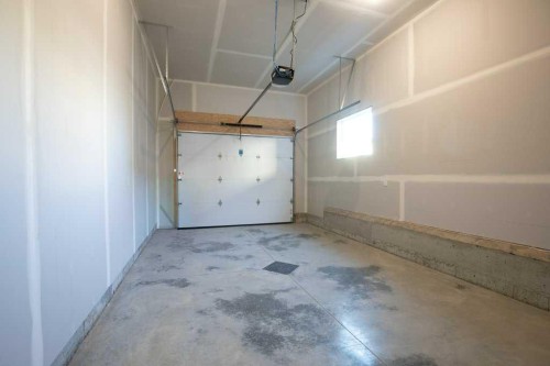 116 Gray Close, Sylvan Lake, AB - Indoor Photo Showing Garage