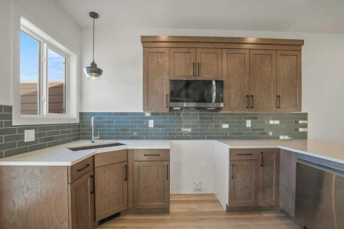 116 Gray Close, Sylvan Lake, AB - Indoor Photo Showing Kitchen With Upgraded Kitchen