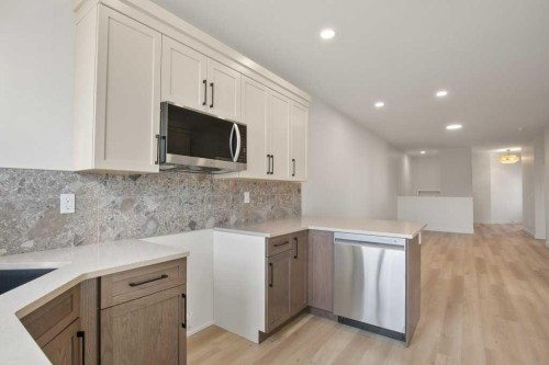 112 Gray Close, Sylvan Lake, AB - Indoor Photo Showing Kitchen With Upgraded Kitchen