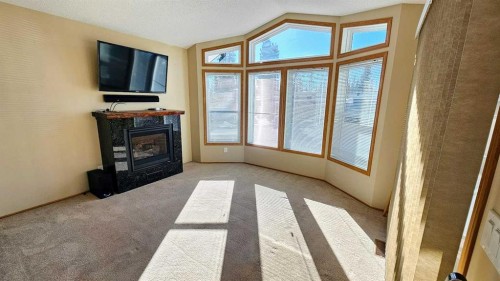 28-32351 Range Road 55, Rural Mountain View County, AB - Indoor With Fireplace