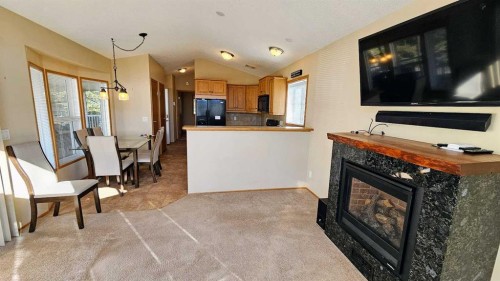 28-32351 Range Road 55, Rural Mountain View County, AB - Indoor With Fireplace