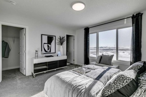 639 Chelsea Pier Run, Chestermere, AB - Indoor Photo Showing Bedroom