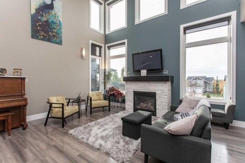 30 Parkridge Crescent, Blackfalds, AB - Indoor Photo Showing Living Room With Fireplace