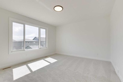 612 Buffaloberry Manor Se, Calgary, AB - Indoor Photo Showing Other Room