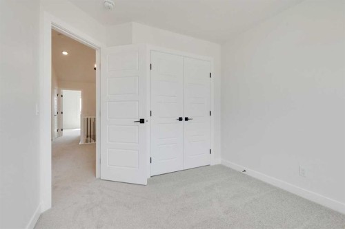 612 Buffaloberry Manor Se, Calgary, AB - Indoor Photo Showing Other Room