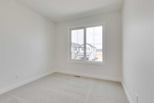 612 Buffaloberry Manor Se, Calgary, AB - Indoor Photo Showing Other Room