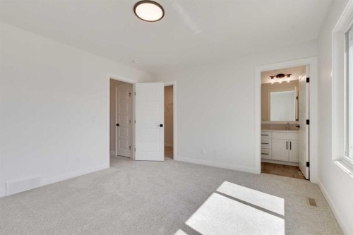 612 Buffaloberry Manor Se, Calgary, AB - Indoor Photo Showing Other Room