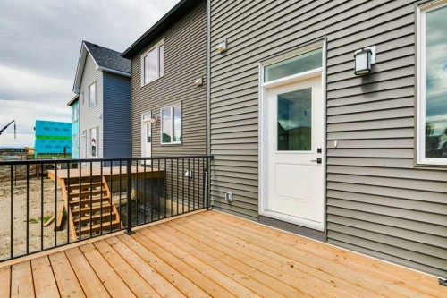 612 Buffaloberry Manor Se, Calgary, AB - Outdoor With Deck Patio Veranda With Exterior