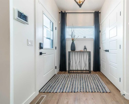 704 Langley Terrace Se, Airdrie, AB - Indoor Photo Showing Other Room