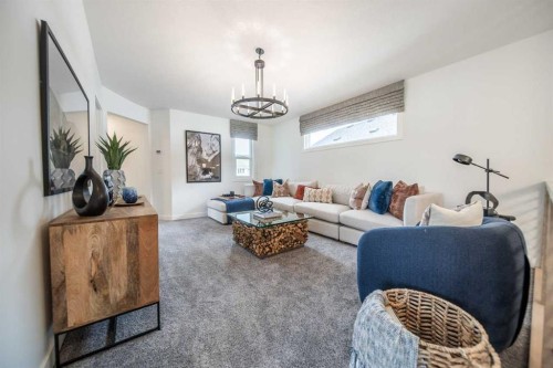704 Langley Terrace Se, Airdrie, AB - Indoor Photo Showing Living Room