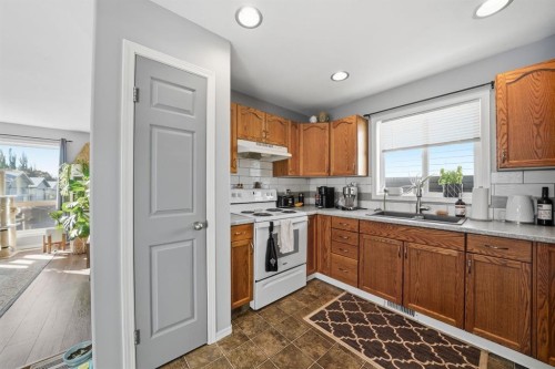 106 Drummond Close, Red Deer, AB - Indoor Photo Showing Kitchen With Double Sink