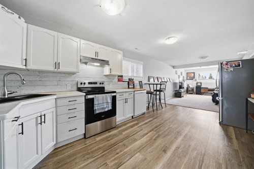 106 Drummond Close, Red Deer, AB - Indoor Photo Showing Kitchen With Upgraded Kitchen