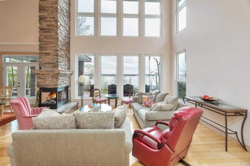 185 Birchcliff Road, Birchcliff, AB - Indoor Photo Showing Living Room With Fireplace