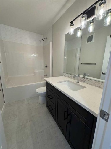 38 Tagish Avenue, Red Deer, AB - Indoor Photo Showing Bathroom