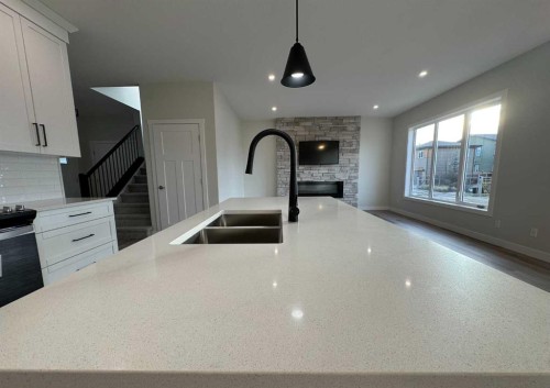 38 Tagish Avenue, Red Deer, AB - Indoor Photo Showing Kitchen With Double Sink With Upgraded Kitchen