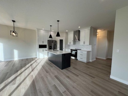 38 Tagish Avenue, Red Deer, AB - Indoor Photo Showing Kitchen With Upgraded Kitchen