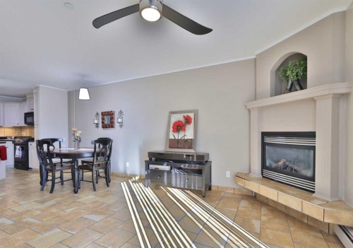 105-4834 52A Street, Camrose, AB - Indoor With Fireplace