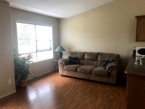 7017 Deer Street, Lacombe, AB - Indoor Photo Showing Living Room