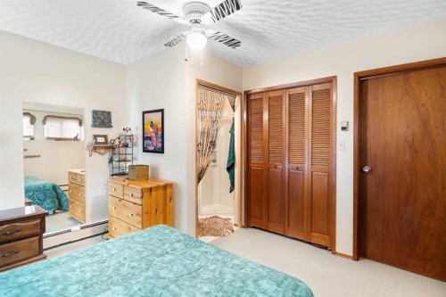 5014 43 Street, Sylvan Lake, AB - Indoor Photo Showing Bedroom