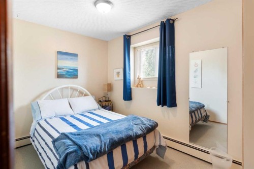 5014 43 Street, Sylvan Lake, AB - Indoor Photo Showing Bedroom