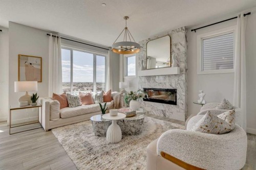 18 Lewiston Row Ne, Calgary, AB - Indoor Photo Showing Living Room With Fireplace