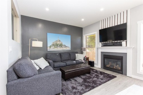 347 Addington Drive, Red Deer, AB - Indoor Photo Showing Living Room With Fireplace