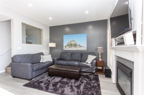 347 Addington Drive, Red Deer, AB - Indoor Photo Showing Living Room With Fireplace