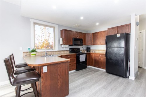 347 Addington Drive, Red Deer, AB - Indoor Photo Showing Kitchen With Double Sink