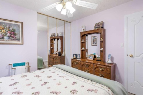 3 Rustic Road, Norglenwold, AB - Indoor Photo Showing Bedroom