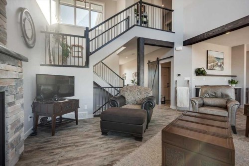 5 Leonard Close, Sylvan Lake, AB - Indoor Photo Showing Living Room With Fireplace