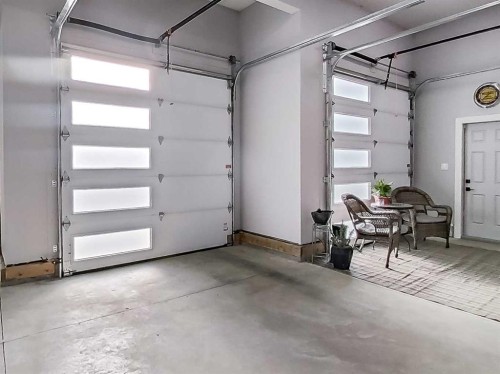 5 Leonard Close, Sylvan Lake, AB - Indoor Photo Showing Garage