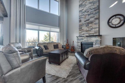 5 Leonard Close, Sylvan Lake, AB - Indoor Photo Showing Living Room With Fireplace