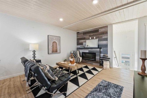 6 Metcalf Way, Lacombe, AB - Indoor With Fireplace