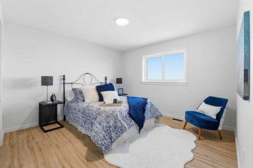 6 Metcalf Way, Lacombe, AB - Indoor Photo Showing Bedroom