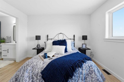 6 Metcalf Way, Lacombe, AB - Indoor Photo Showing Bedroom