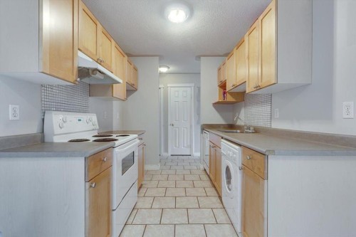 354-103 Hermary Street, Red Deer, AB - Indoor Photo Showing Kitchen