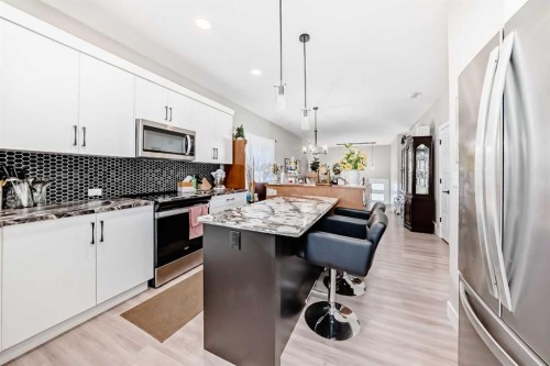 11 Ian Way, Sylvan Lake, AB - Indoor Photo Showing Kitchen With Upgraded Kitchen