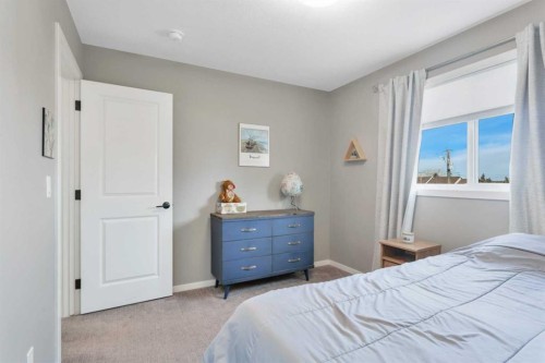 4633 48 Street, Sylvan Lake, AB - Indoor Photo Showing Bedroom