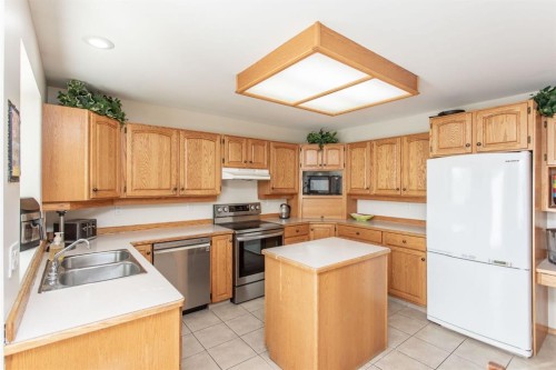179 Douglas Avenue, Red Deer, AB - Indoor Photo Showing Kitchen With Double Sink