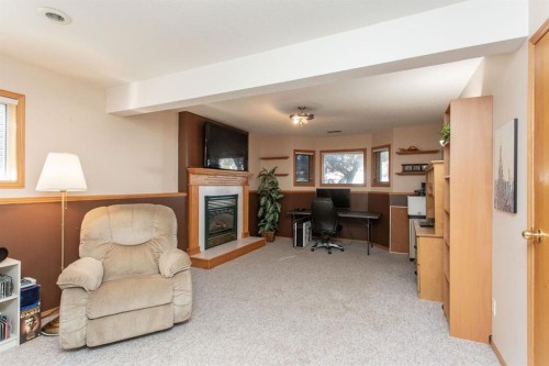 179 Douglas Avenue, Red Deer, AB - Indoor With Fireplace