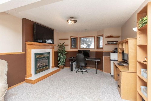 179 Douglas Avenue, Red Deer, AB - Indoor With Fireplace