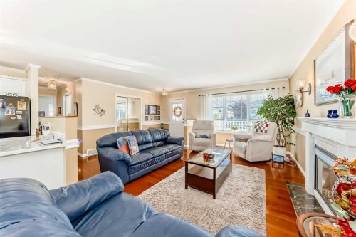 4514 54A Ave Cres, Innisfail, AB - Indoor Photo Showing Living Room With Fireplace