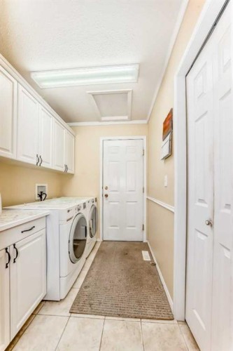 4514 54A Ave Cres, Innisfail, AB - Indoor Photo Showing Laundry Room